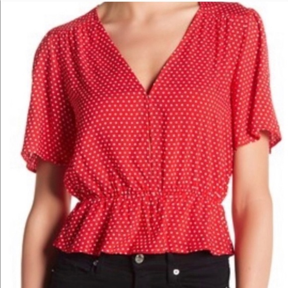 red polka dot peplum top